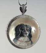 A SILVER DIAMOND SET ESSEX CRYSTAL DOG PENDANT.