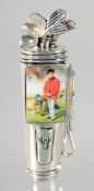 A SILVER PLATED ENAMEL GOLFING VESTA, 7 cm.