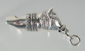 A SILVER HORSE'S HEAD WHISTLE, 4.5 cm
