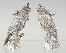 A GOOD PAIR OF SILVER PLATED COCKATOO SALT AND PEPPERS.