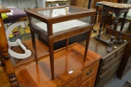 A miniature mahogany bijouterie table.