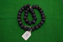 Decorative bead necklace.