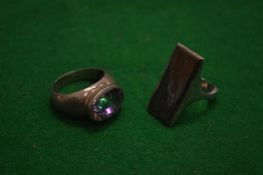 Two silver designer rings.