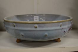 A Chinese Song style circular bowl on three feet.