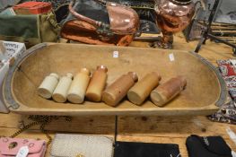 A pig salting trough and stoneware jars.