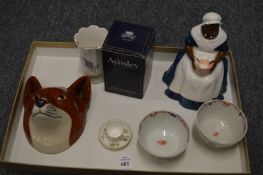 Two famille rose tea bowls and other decorative china.