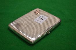 A Russian silver cigarette case.
