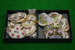 A collection of porcelain decanter labels.