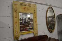 Two decorative mirrors.