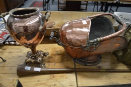 A copper hunting horn, coal bucket and samovar.