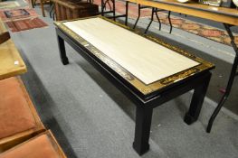 A Chinese black lacquer and gilt decorated rectangular coffee table.