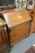 An Edwardian mahogany bureau.