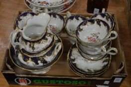 A floral decorated part tea service.