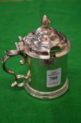 A heavy silver drum shaped mustard pot with hinged cover.