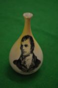 A small Carltonware vase depicting Robert Burns.