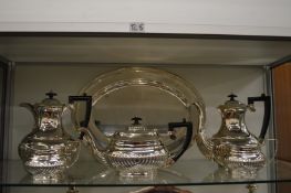 A Mappin and Webb five piece tea and coffee service together with a similar oval tray.