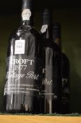 Three bottles of Croft 1977 vintage port.