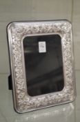 A silver photo frame.