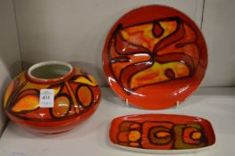 Three pieces of Poole Delphis pottery.