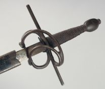 A swept hilt rapier with crucifix hilt and fluid pommel, signed Aug Schneider, Berlin, in a black