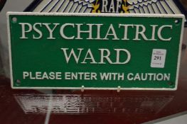 A novelty cast iron sign.