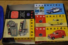 Four boxed Vanguard model toys.