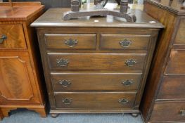 A Bevan Funnell Reprodux oak chest of drawers.