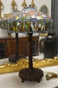 A good large bronze and stained glass tiffany style table lamp.