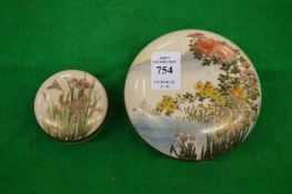 Two satsuma circular boxes and covers.