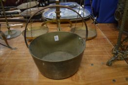 A brass preserve pan.