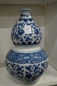 A Chinese blue and white double gourd shaped vase.