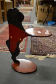 A novelty pug dog waiter.