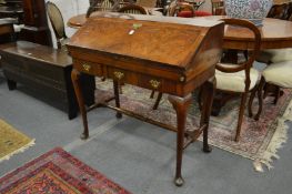 A 18th century walnut bureau on stand.