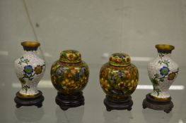 A pair of miniature cloisonne ginger jars and covers and a pair of miniature cloisonne vases, all