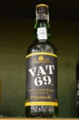 A bottle of VAT 69 whisky.