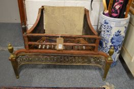 A Regency style fire grate.