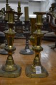 A pair of brass candlesticks.
