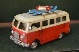 A model surfers camper van.