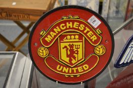 A cast iron sign Manchester United.
