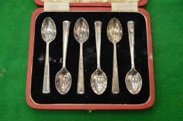 A cased set of six silver coffee spoons.