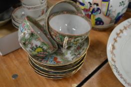 A group of Canton cups and saucers.