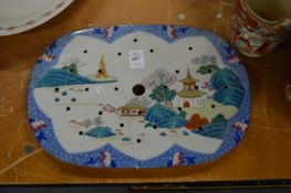 A Spode Chinese style drainer.