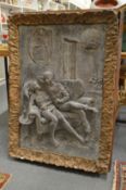 Paul Day relief cast resin plaque depicting figures on a couch.