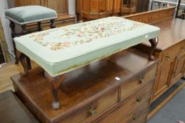 A needlework upholstered large foot stool.