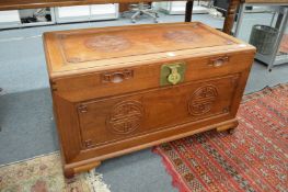 A Chinese camphor wood coffer.