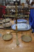 A set of brass balance scales.