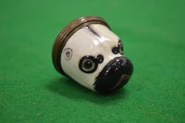 A dogs head enamel pill box.