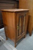 A walnut pot cupboard.
