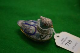 A small cloisonne duck.