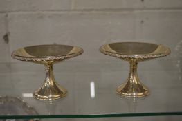 A small pair of silver tazza.